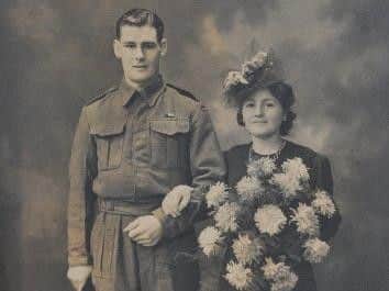 John with his wife Isobel.