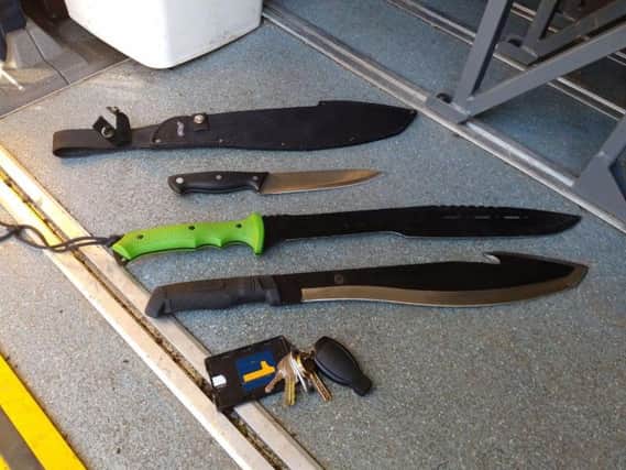 The machetes and knife were found in the street after police responded to a report of a man brandishing a machete in Preston