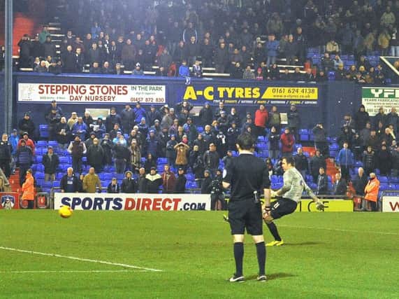 Thorsten Stuckmann scores from the penalty spot for Preston against Oldham in November 2014