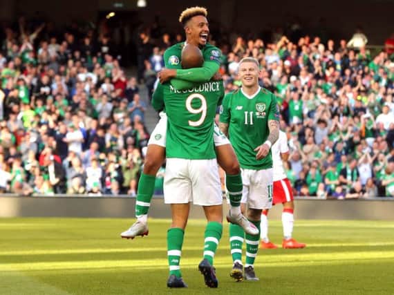 Callum Robinson congratulates David McGoldrick after the Republic of Ireland's opening goal against Gibraltar