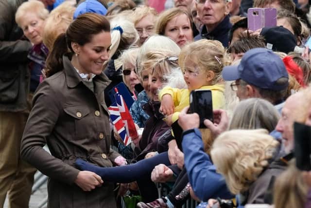 Catherine, Duchess of Cambridge meets members of the public (Photo by Ian Forsyth/Getty Images)