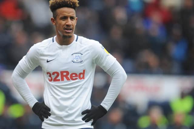 Callum Robinson wearing the club's home shirt, sponsored by 32Red