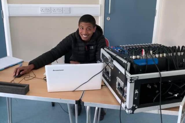 Gilbert Woods, Project Perform's 14-year-old sound technician.