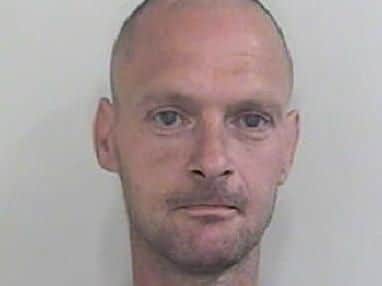 Colin Hannan, from Preston, is wanted by police in relation to two burglaries in May 2019