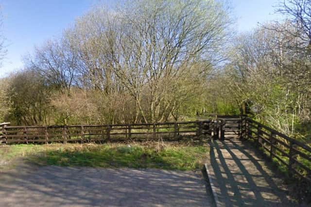 Police were called to Foxhill Bank Nature Reserve in Oswaldtwistle at 7.35am on Sunday after a man's body was found in the woods