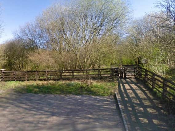 Police were called to Foxhill Bank Nature Reserve in Oswaldtwistle at 7.35am on Sunday after a man's body was found in the woods