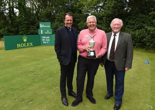 Colin Montgomerie with David MacLaren (left), head of the Staysure Tour, and Howard Dempsey (right), chairman of the championship 
committee at Royal Lytham and St Annes (photo: Dan Martino)