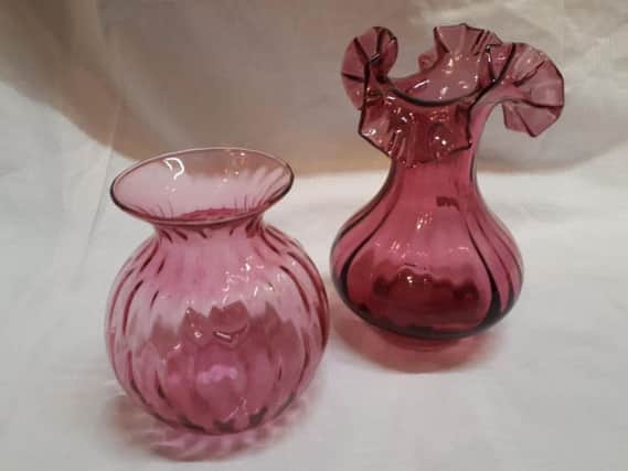 These vases are good examples of cranberry glass