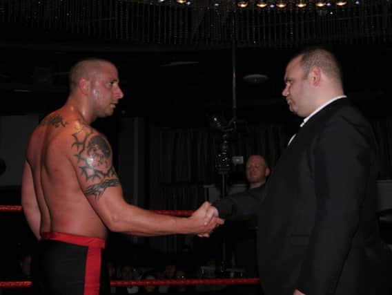 2013: 30-man rumble winner Lionheart shakes hands with PCW owner and promoter Steven Fludder at PCW's Springslam event at Lava & Ignite, Preston. Pictures courtesy of Gordon Harris
