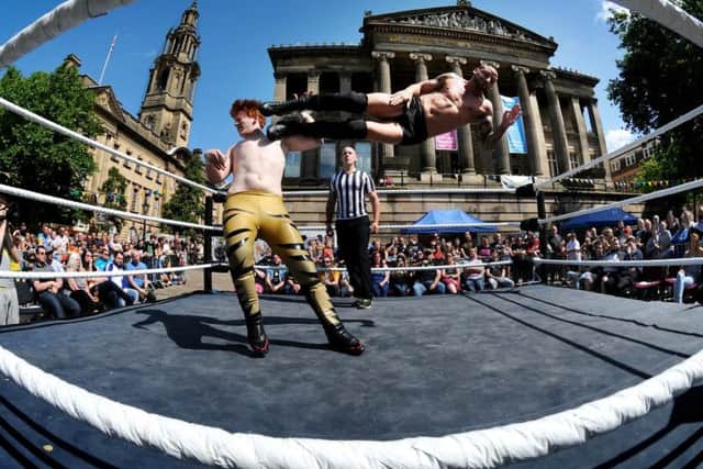 2016: Preston City Wrestling Club held a free event at Preston Flag Market to celebrate its fifth anniversary. Jack Garvin gets a flying kick from Lionheart