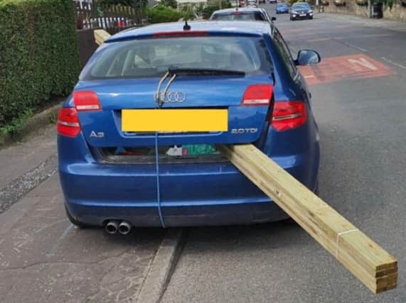 The Audi A3 was stopped in the Blackburn area this morning (June 25) after officers spotted a giant plant of wood protruding from the boot