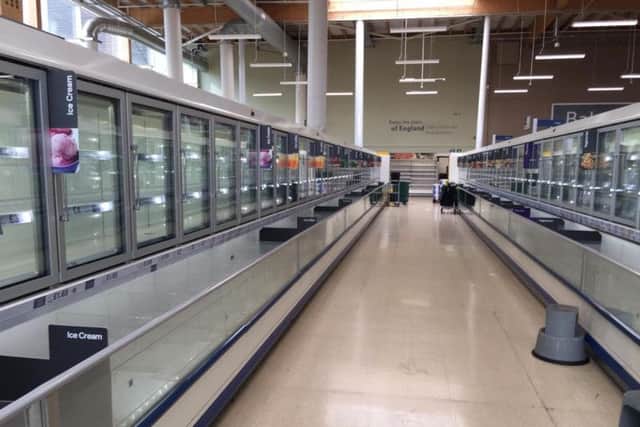 No food in the frozen aisles at Tesco Buckshaw Village (JPIMedia)