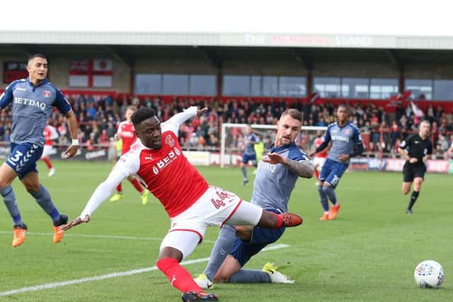 Patrick Bauer, playing for former club Charlton, tackles Devante Cole at Fleetwood