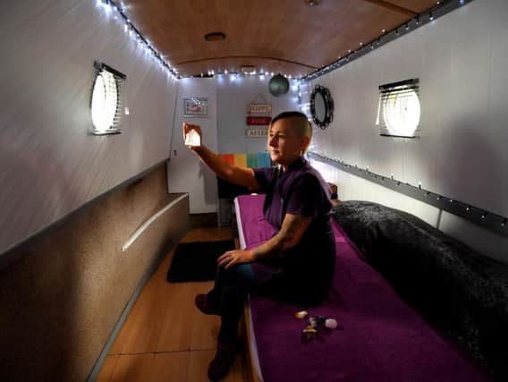 Michelle Johnson with healing crystals