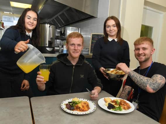 Larches School pupil sdish up lunch at Preston's Foxton Centre