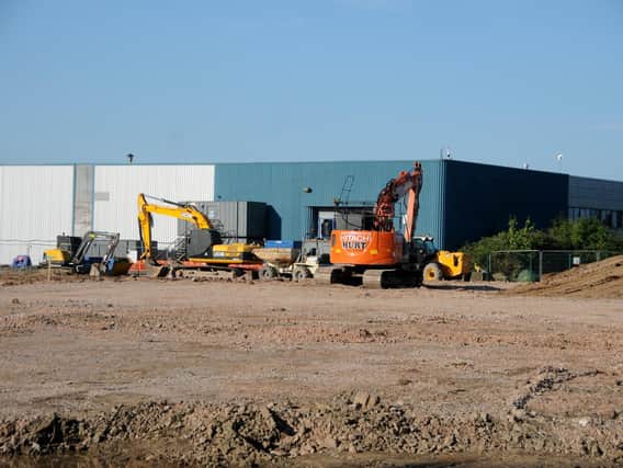 Diggers at the site of the new retail park in Olivers Place in Fulwood