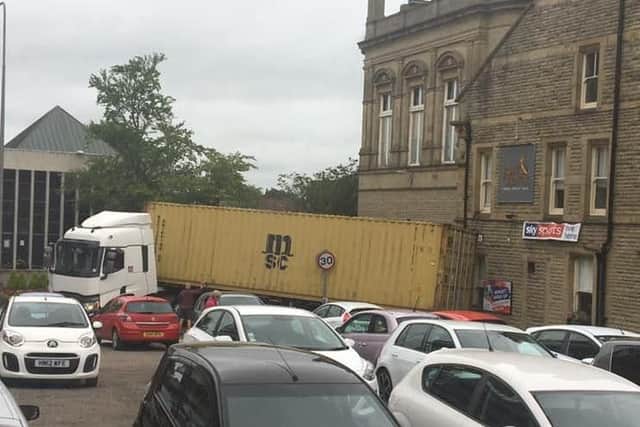 A lorry has become stuck at the end of Dole Lane in Chorley town centre this morning (July 1)