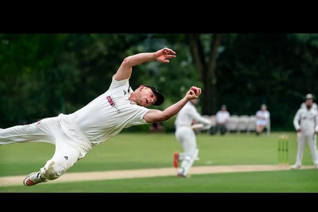Garstang's Dan Curwen takes a flying catch to dismiss Charlie Rossier. Pic: Tim Gilbert/Preston Photographic Society