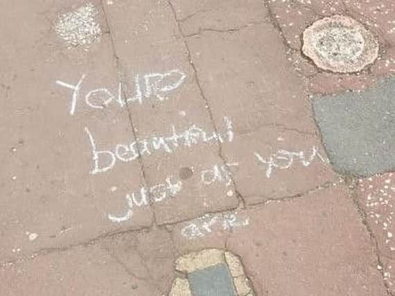 One of the Guides' pavement messages