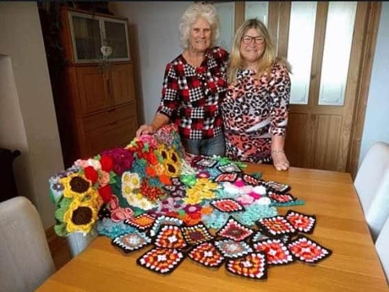 Iris Smith and Kay Carson with  a Bloom creation