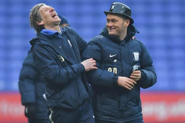 Alex Neil gets into the spirit of Gentry Day with kitman Steve Cowell at Bolton in February 2018