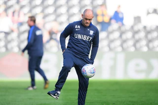 PNE manager Alex Neil shows off a few skills with the football