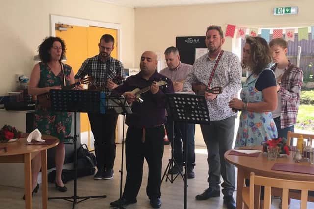 The Preston Ukulele Strummers Society regularly play at local care homes for the residents.
