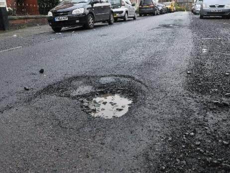 The state of Britain's roads has been described as a national disgrace by MPs