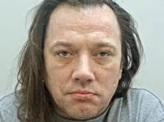 Warren Givens, 44, has been jailed for 13 years after slashing a man's throat in Preston on Christmas Day.