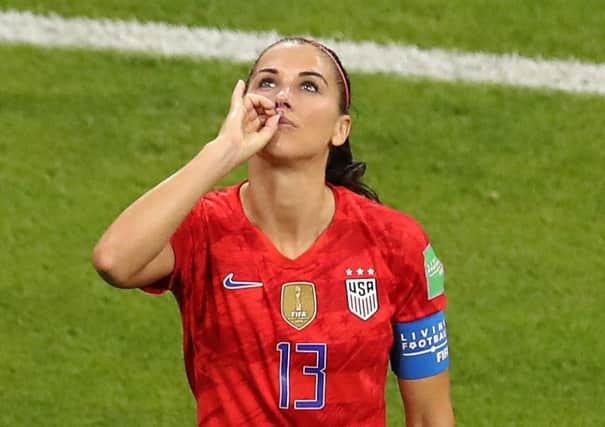 USA star Alex Morgan celebrates scoring the winner against England in the Womens World Cup semi-final (photos: Getty Images)