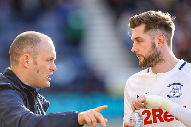 PNE manager Alex Neil gives instructions to Tom Barkhuizen