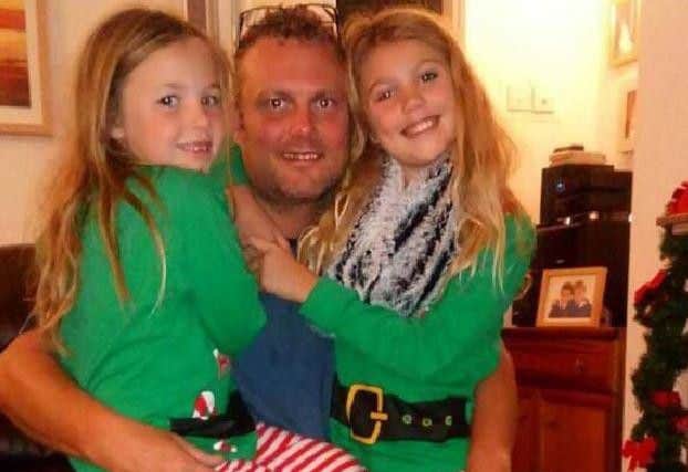 Lancashire Police officer David Fairhurst and his daughters Matilda and Annabelle