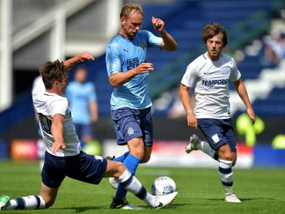 Ben Davies makes a tackle when PNE met Newcastle United  in a friendly in July 2017