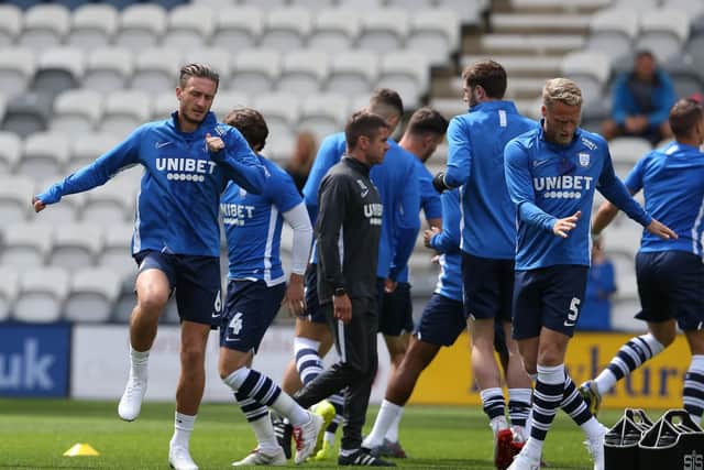 The Preston squad warm-up before the game against Southampton