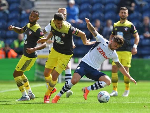 Preston striker Sean Maguire challenges for the ball against Southampton at Deepdale