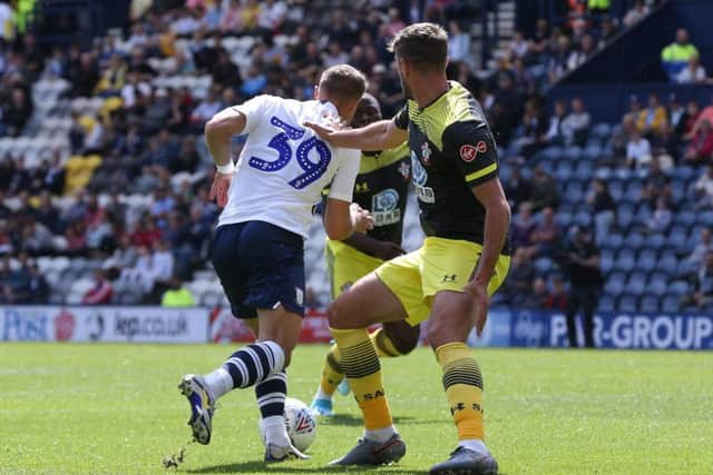 Billy Bodin moves into the box ahead of scoring for Preston against Southampton at Deepdale