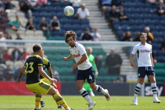 PNE midfielder reaches the ball ahead of Southampton's Pierre-Emile Hojbjerg