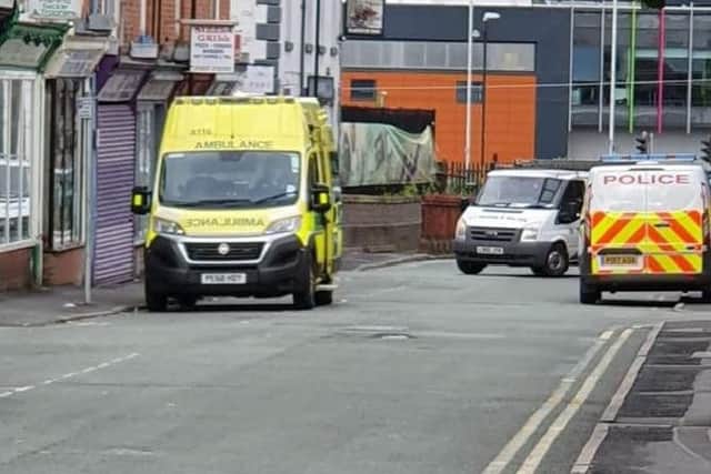 An ambulance has joined the heavy police presence in Steeley Lane, Chorley this morning