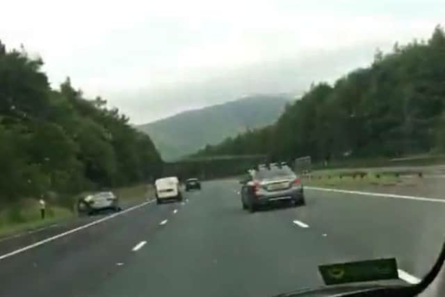 Cars had to undertake American travel writer Rick Steves as he filmed his journey whilst hogging the middle-lane of the M6 in Cumbria on Sunday (July 21)