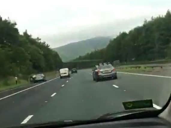 Cars had to undertake American travel writer Rick Steves as he filmed his journey whilst hogging the middle-lane of the M6 in Cumbria on Sunday (July 21)