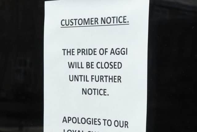 Sign placed in the window of Pride of Aggi in May 2019 (JPIMedia)
