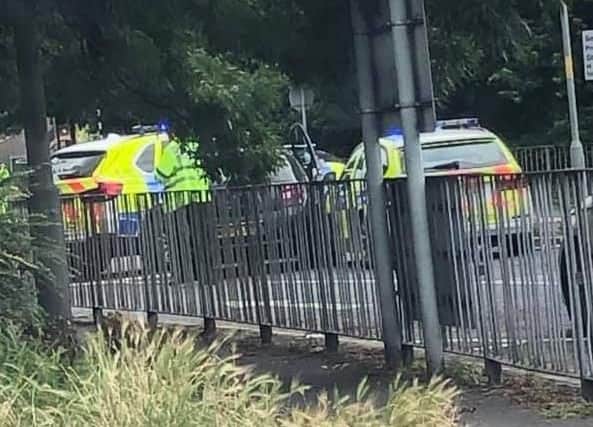 A mas has been arrested after a Citroen DS3 crashed into a roundabout in Leyland after being being chased by police. Credit: Lynsey Jenkins