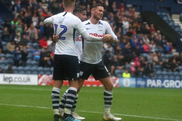 Paul Gallagher is congratulated by Alan Browne after scoring Preston's second goal against Newcastle