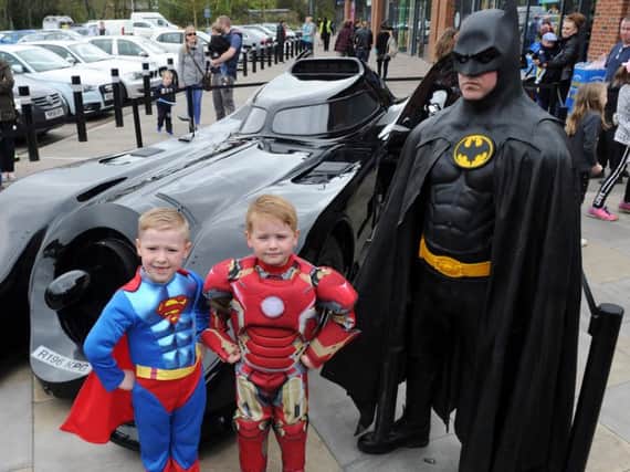 Holbert, six, and Harry Quinn, five, with Batman with the Batmobile (Photo: Steve Riding)