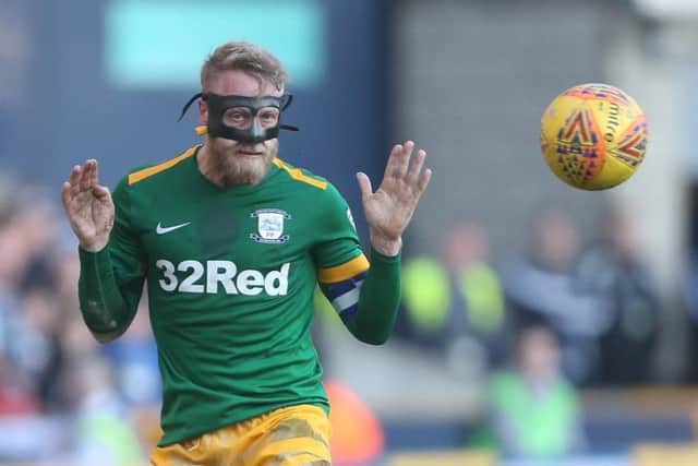 Masked man Clarke at The Den last season