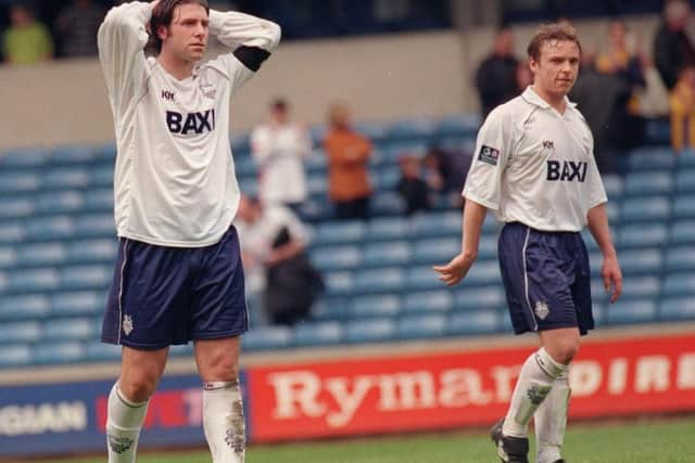 Sean Gregan and Paul McKenna at the final whistle after Preston let a two-goal lead slip against Millwall
