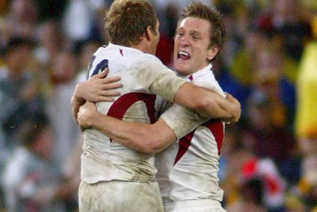 Jonny Wilkinson (left) celebrates with team mate Will Greenwood during the rugby World Cup final in 2003