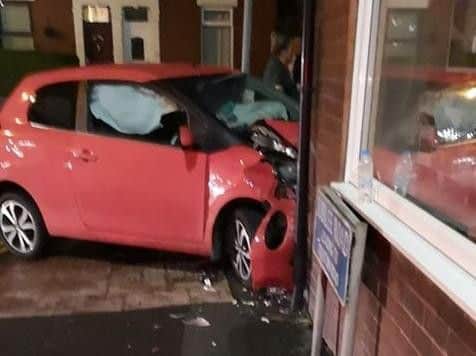 The Toyota Aygo crashed into Holdens Estate Agents in Watkin Lane, Lostock Hall at around 11.15pm last night (August 1)