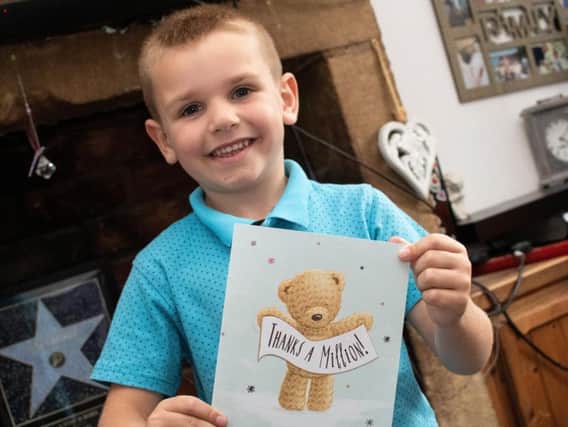 Jaxon Youd, from Hoghton, near Preston, has been hailed a 'real-life superhero' for saving a dog from a flooded stream.