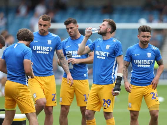 The Preston North End players in the warm-up ahead of kick-off at Millwall